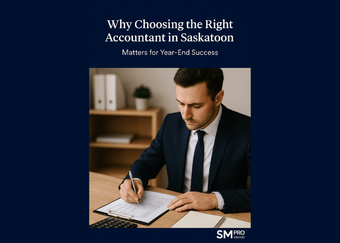 Professional accountant in Saskatoon reviewing year-end financial documents at SM Pro Services office, representing expert accounting firms in Saskatoon.